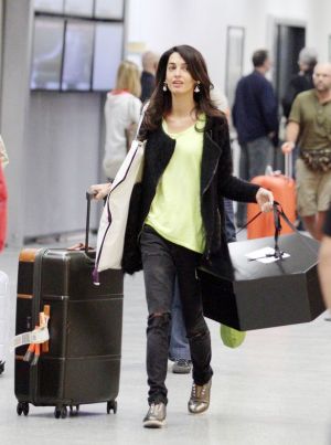 Amal-Alamuddin-arrives-at-the-airport-in-Italy pre-marriage-to-George-Clooney.jpg